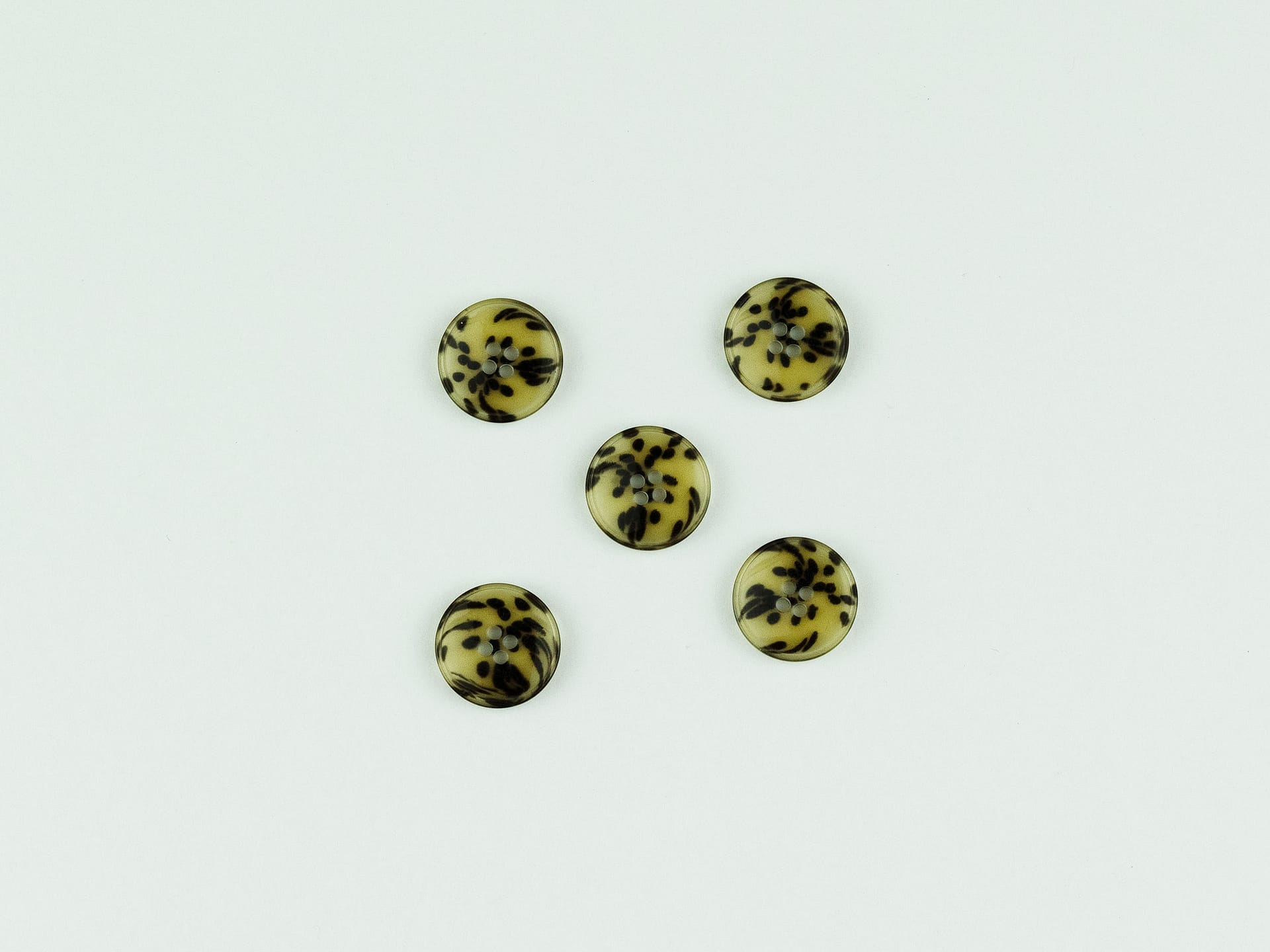 Buttons with suspended black dots 15mm